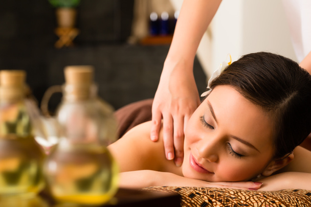 Chinese Woman at wellness massage with essential oils - Photo, Image