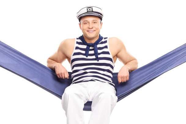 young sailor sitting on a hammock a - Photo, image