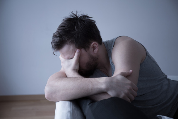 Tired man with headache - Fotografie, Obrázek