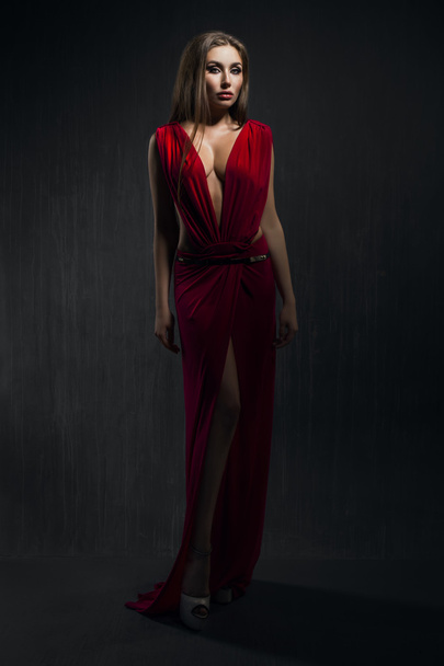 Fashion model in  beautiful red dress - Фото, изображение