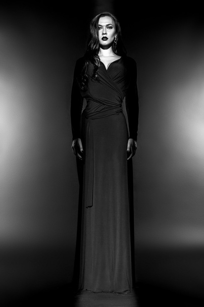 Fashion model in black dress - Foto, imagen