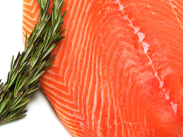 Raw salmon with rosemary - Фото, изображение