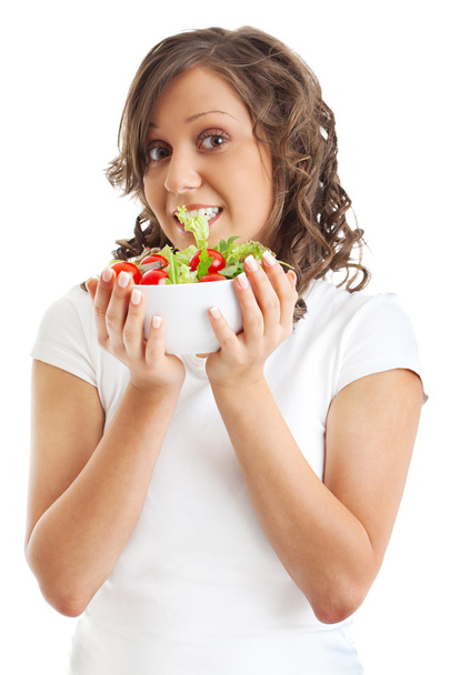 Νεαρή γυναίκα τρώει σαλάτα healhty - Φωτογραφία, εικόνα