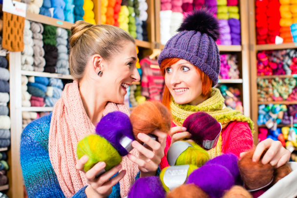 Young women in knitting shop - Photo, Image