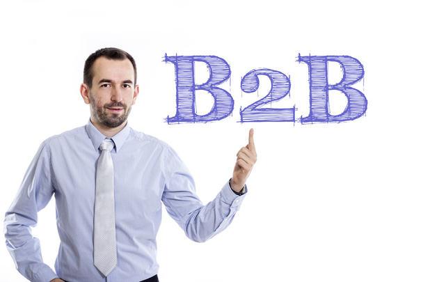 B2B - Young businessman with blue text - Zdjęcie, obraz