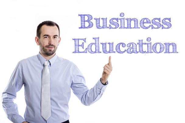 Üzleti oktatás - fiatal üzletember, kék szöveggel - Fotó, kép
