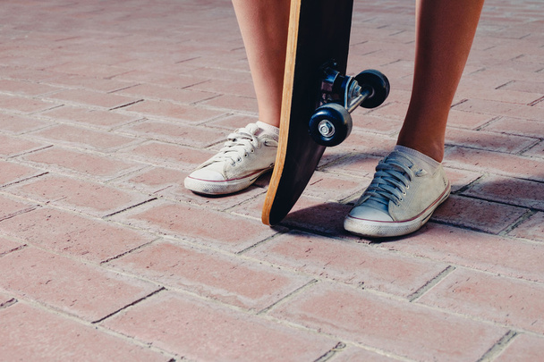 Sporty legs and skateboard - Foto, Imagem