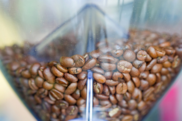 Close-up espresso coffee machine with roasted coffee beans. - Фото, изображение