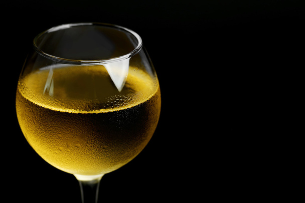 Glass of wine on dark background - Φωτογραφία, εικόνα