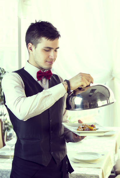 waiter with a tray - Фото, зображення