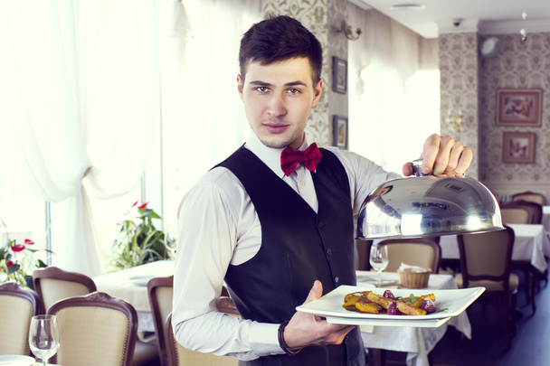 waiter with a tray - Фото, зображення