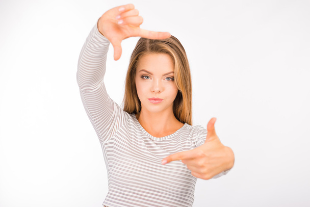 cute young woman gesturing finger frame - Photo, image