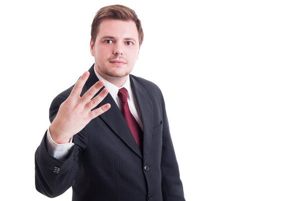 Accountant or businessman showing number four with fingers - 写真・画像