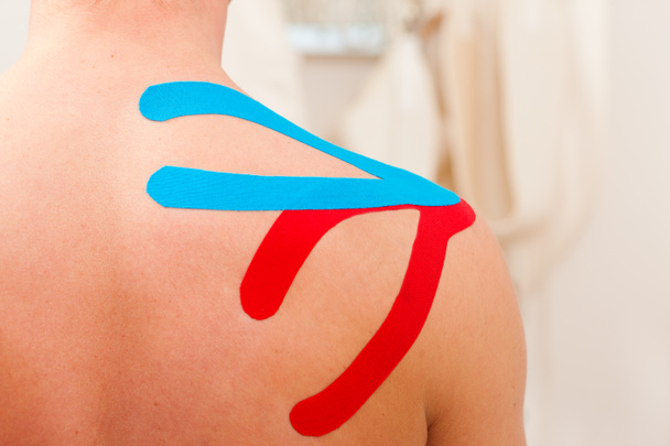 Patient at the physiotherapy with tape - Photo, Image