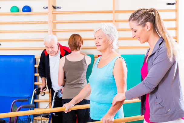 Seniors in physical rehabilitation therapy - Photo, Image