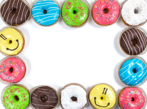 assorted glazed doughnuts in different colors  - Photo, Image