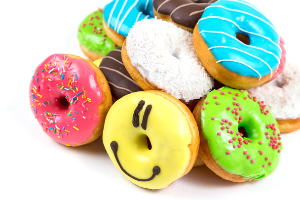 Valikoima lasitettu donitseja eri värejä
  - Valokuva, kuva