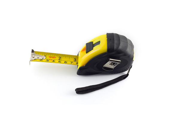 Yellow tape measure or steel tape isolated white background. - Zdjęcie, obraz