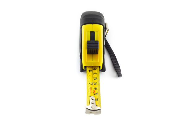 Yellow tape measure or steel tape isolated white background. - 写真・画像