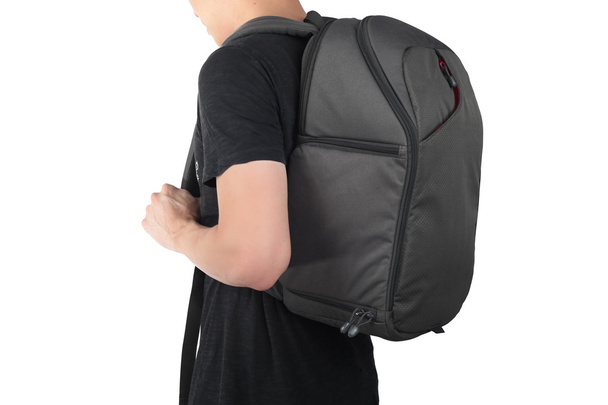 Young man standing with travel backpack equipments isolated whit - Fotoğraf, Görsel