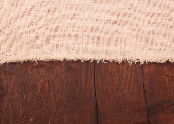 Burlap on wooden table - Photo, Image