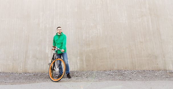 happy young hipster man with fixed gear bike - Photo, image