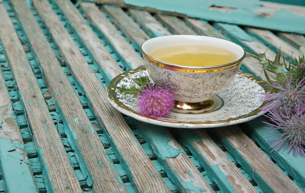 Tej thistle tea - Fotó, kép