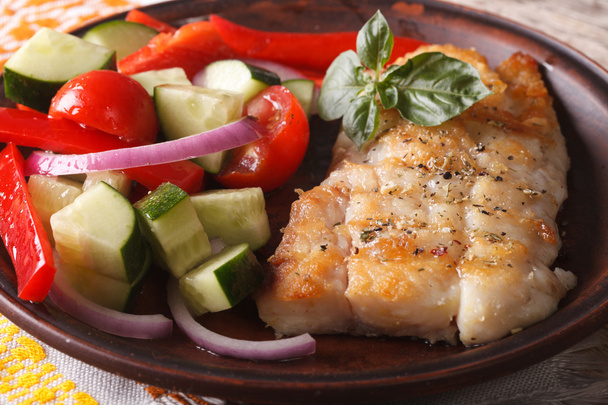 grilling fish fillets and fresh vegetable salad close-up - Photo, Image