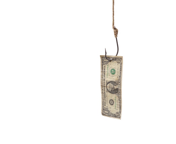 Dollarin seteli roikkuu koukussa
 - Valokuva, kuva