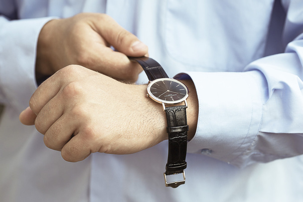 men's watches on the arm - 写真・画像