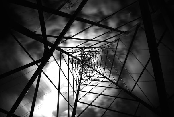 Electricity Pylon with clouds moving in Black and White - Photo, Image