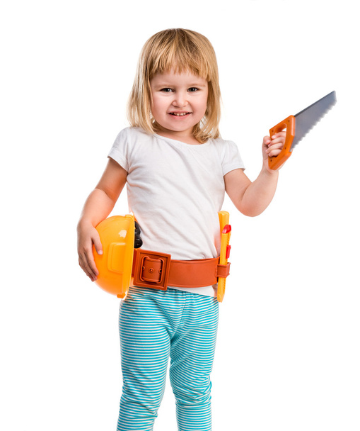 little girl with helmet and instruments - Φωτογραφία, εικόνα