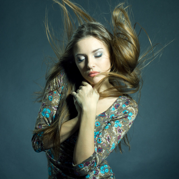 Fashion portrait of beautiful woman with streaming hair - Φωτογραφία, εικόνα
