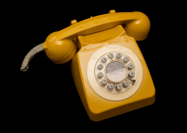 mosterd retro stijl telefoon - Foto, afbeelding