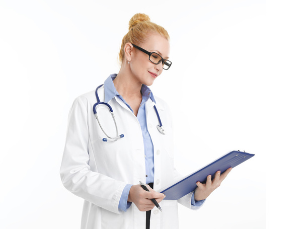 Female doctor holding clipboard - Фото, зображення