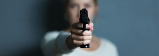 Pointing a gun to someone  - Foto, imagen