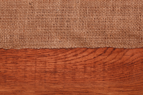 Burlap on wooden table - Фото, зображення