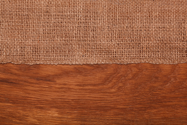 Burlap on wooden table - Photo, image