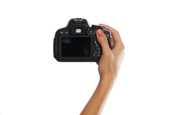 Γυναικείο χέρι με ψηφιακή φωτογραφική μηχανή που απομονώνονται σε λευκό - Φωτογραφία, εικόνα