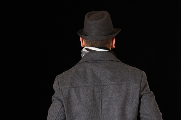 άνθρωπος σε ένα ύφασμα σακάκι - που παρατηρείται από πίσω - Φωτογραφία, εικόνα
