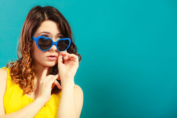 Girl in blue sunglasses - Фото, изображение