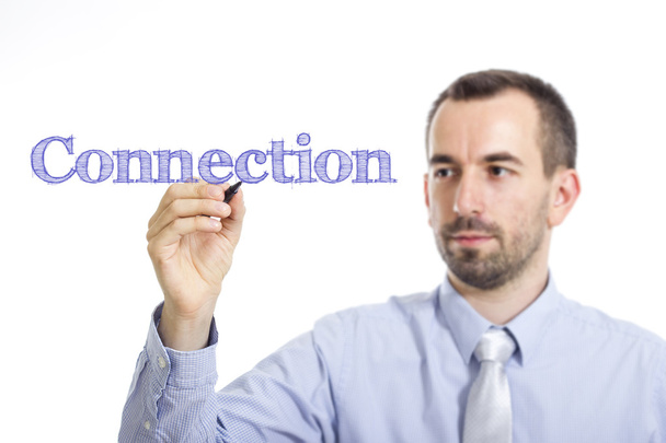 Connection - Young businessman with blue text - Photo, Image
