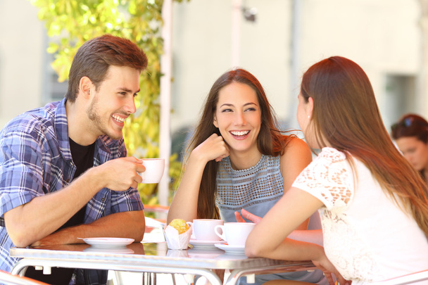 Friends talking in a coffee shop terrace - Zdjęcie, obraz