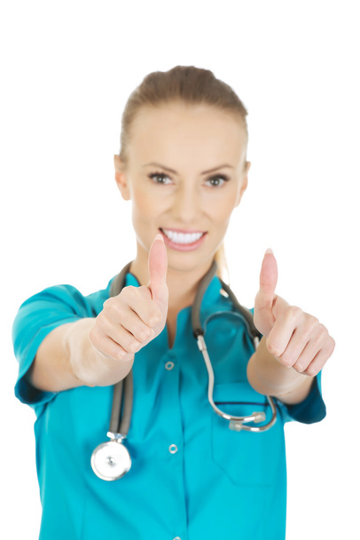 Woman doctor with thumbs up. - Fotoğraf, Görsel