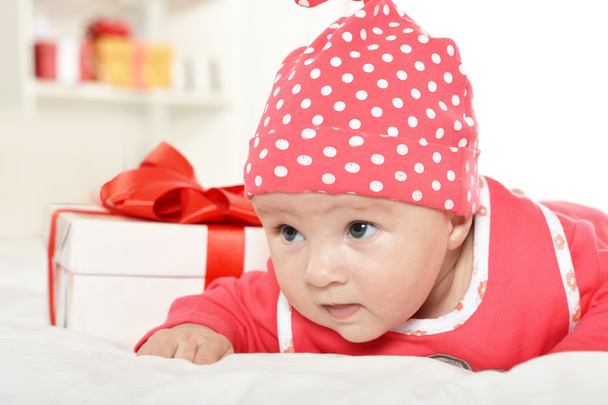Adorable baby girl  with gifts - Zdjęcie, obraz