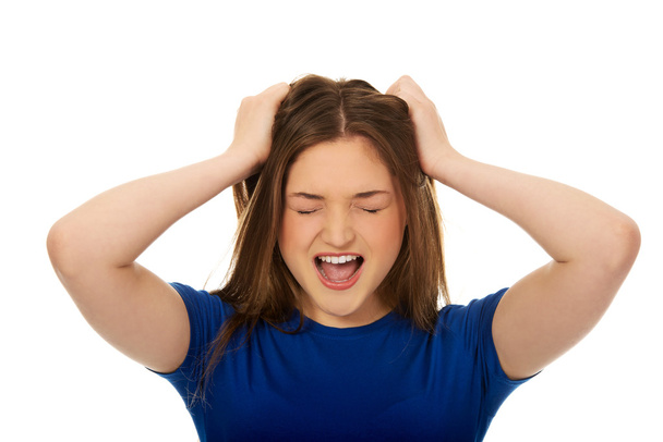 Frustrated young woman screaming. - Foto, imagen
