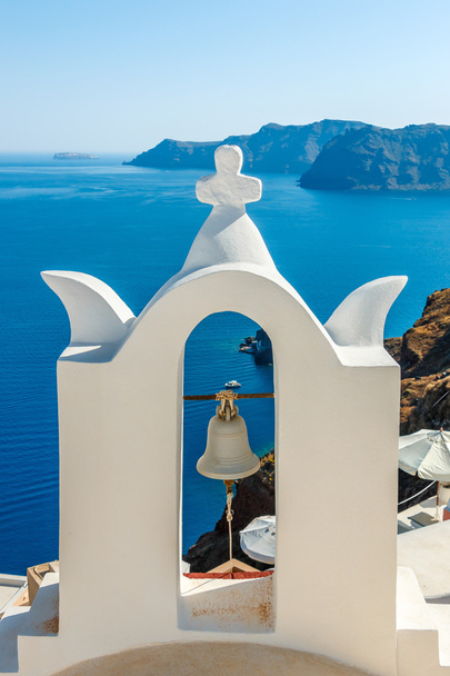 Campanario en la ciudad de Oia, Santorini
 - Foto, Imagen