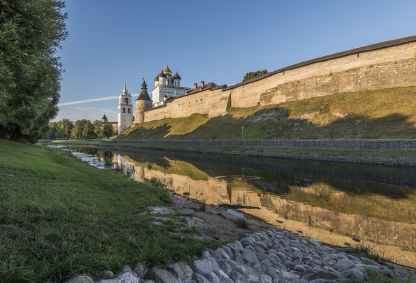 Pskov Kremlin from the side of the Pskova river at sunrise. - 写真・画像