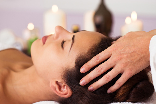 Facial massage. Pretty woman relaxing in the beauty treatment.  - Fotoğraf, Görsel