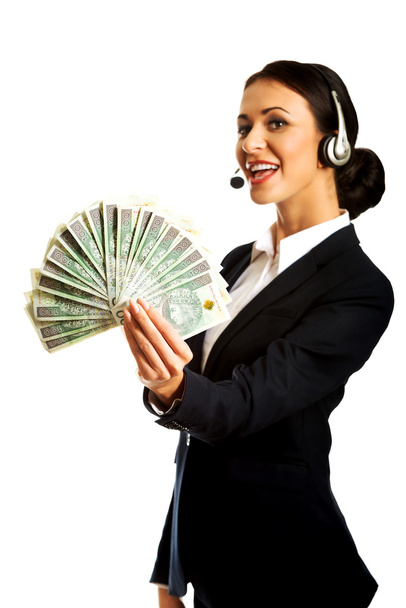 Call center woman holding polish bills - Фото, зображення